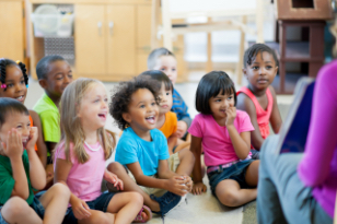 Photo showing a vibrant classroom community engaging in learning.
