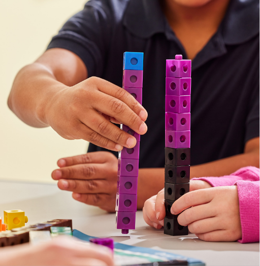 Student counting blocks
